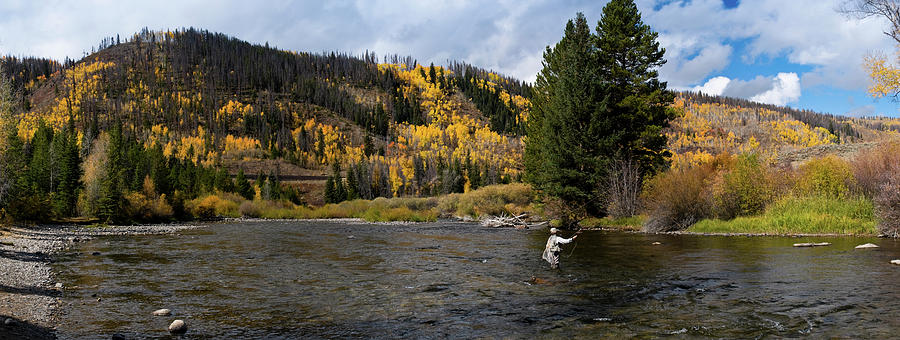 Panoramic Image Of A Woman Fly-fishing by Skibreck