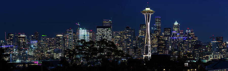 Panoramic Night View Of The Seattle Skyline With The Space Needle And Other Iconic Buildings In The Photograph