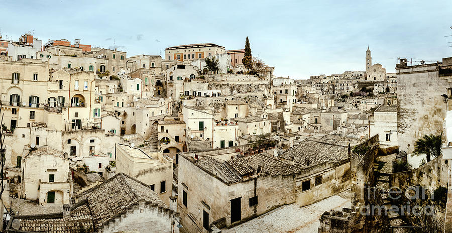 Panoramic view of Matera Sassi di Matera with its steep ancient stone streets European Capital of Cu Photograph by Joaquin Corbalan