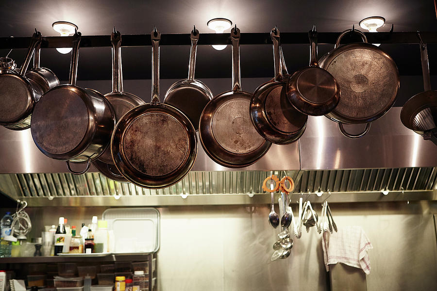 Pot Digital Art - Pans Hanging In Commercial Kitchen by Kathleen Finlay