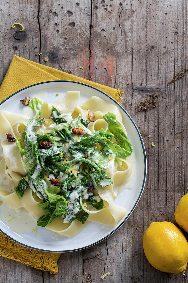 Papardelle With Savoy Cabbage, Lemons And Caramelised Nuts Photograph by Jennifer Braun