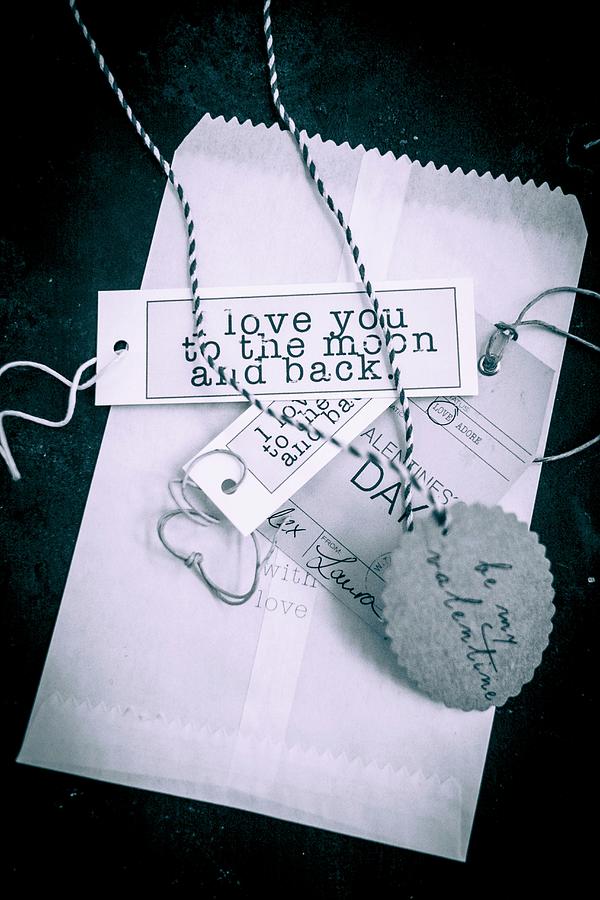 Paper Bag And Labelled Paper Tags For St. Valentines Day Photograph by Eising Studio