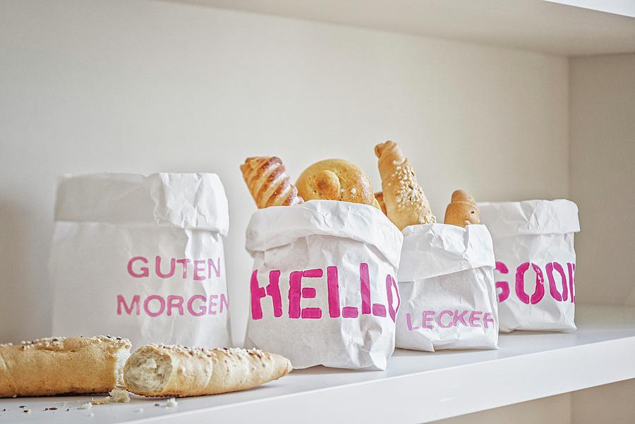 Paper Bags Printed With Various Stencilled Mottos Used As Bread Baskets Photograph by Patsy&christian