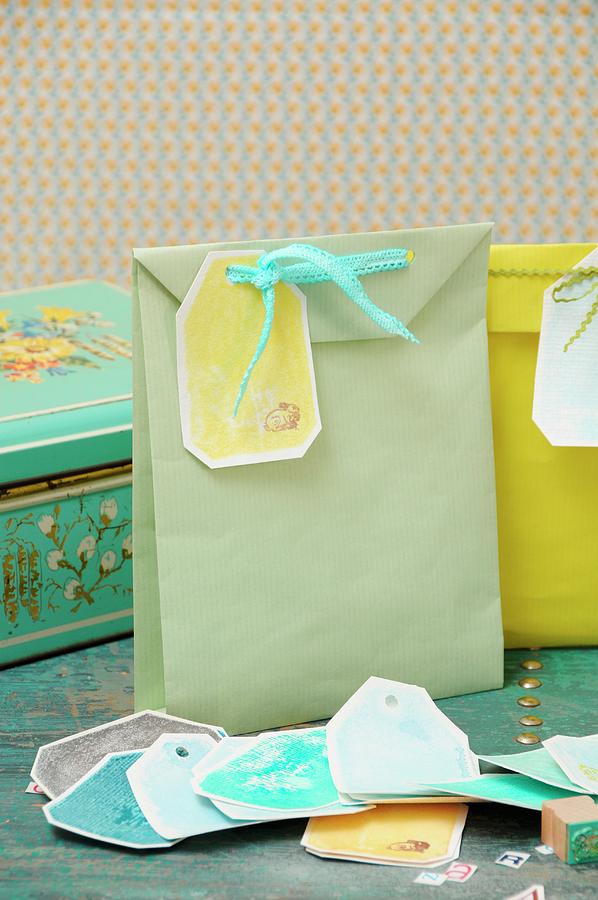 Paper Bags With Hand-crafted Gift Tags Photograph by Revier 51