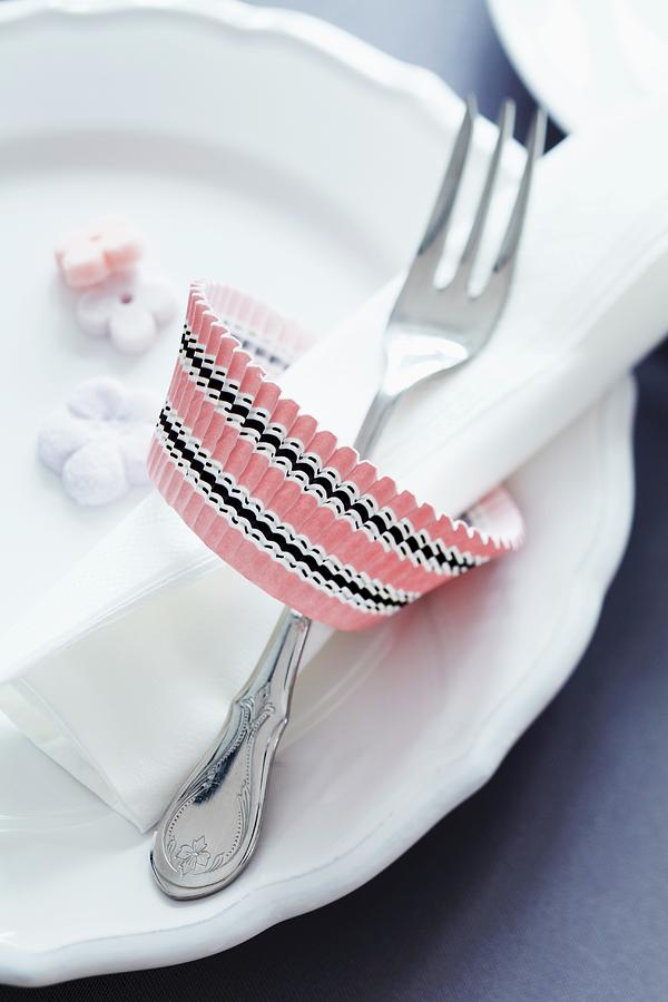 Paper Cake Case Used As Napkin Ring Photograph by Franziska Taube