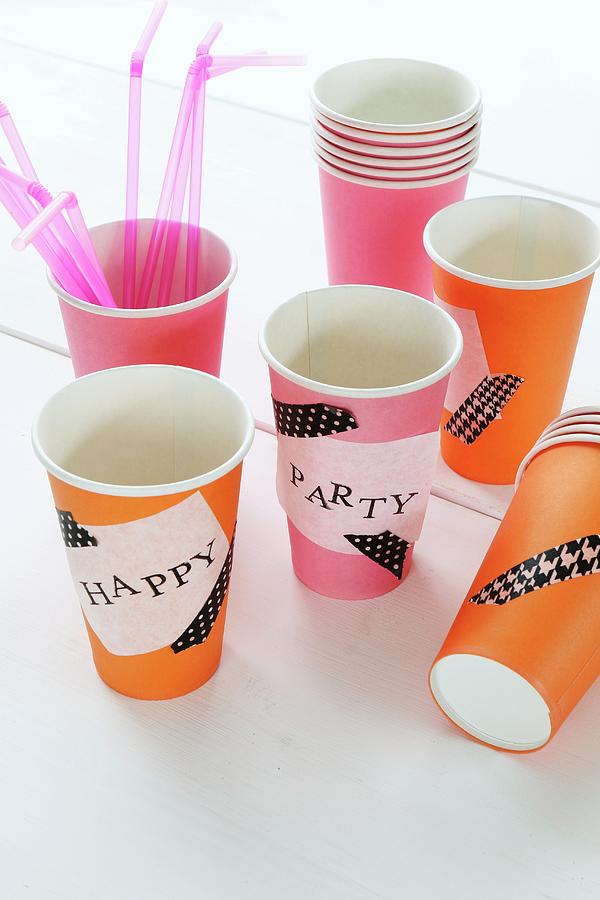 Paper Cups Decorated With Washi Tape And Hand-stamped Labels Photograph by Regina Hippel