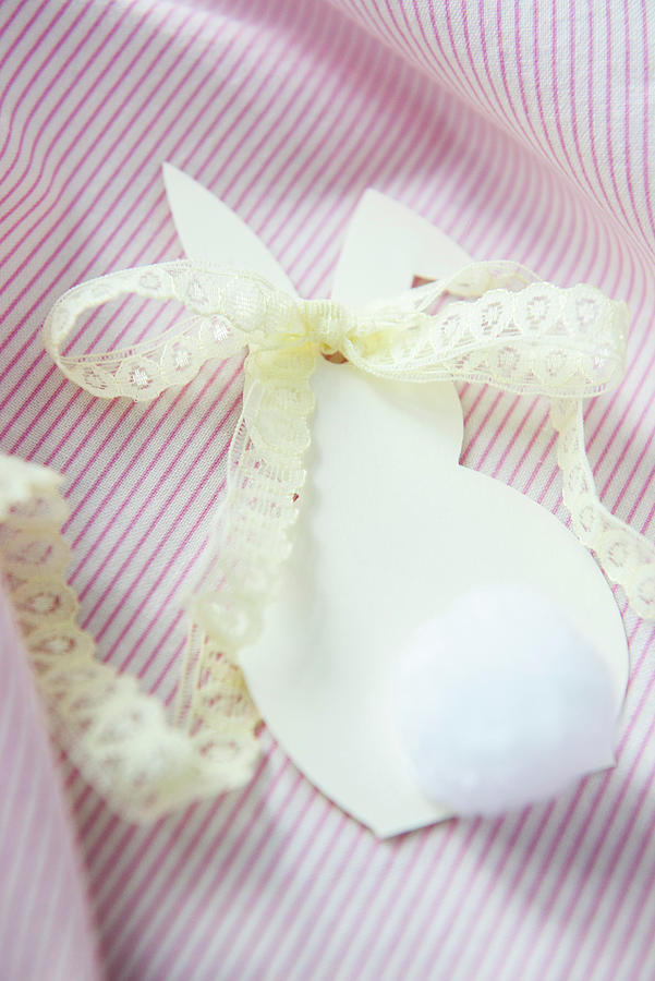 Paper Easter Bunny With Lace Ribbon Photograph by Ruud Pos