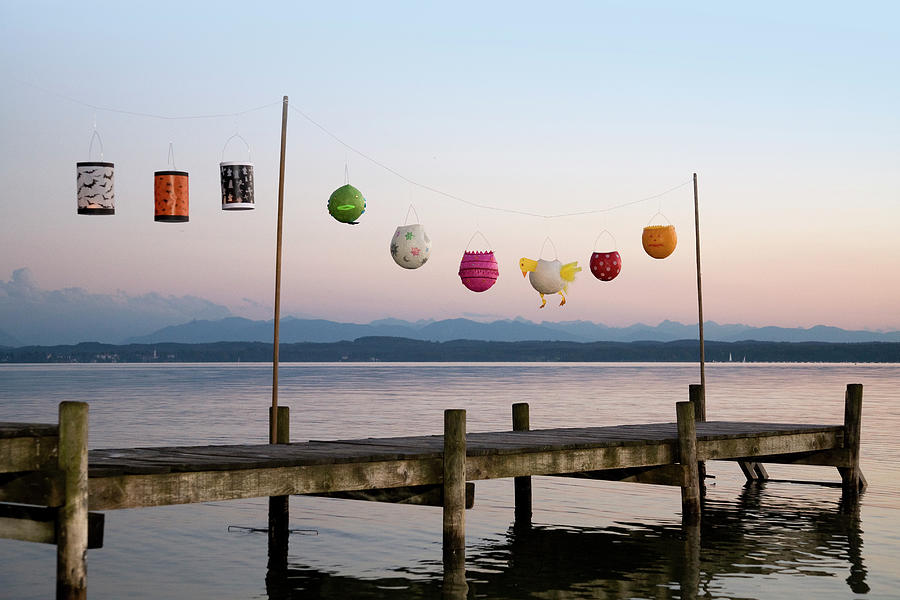 Paper Lanterns Strung Up On Wooden Pier Photograph by Henglein And Steets