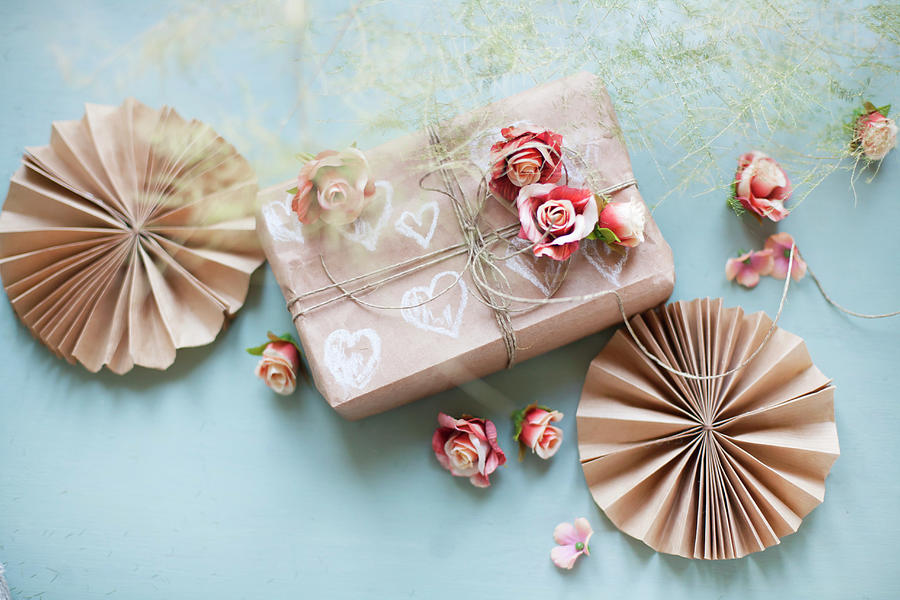 Paper Rosettes, Gift Box And Roses Photograph by Alicja Koll