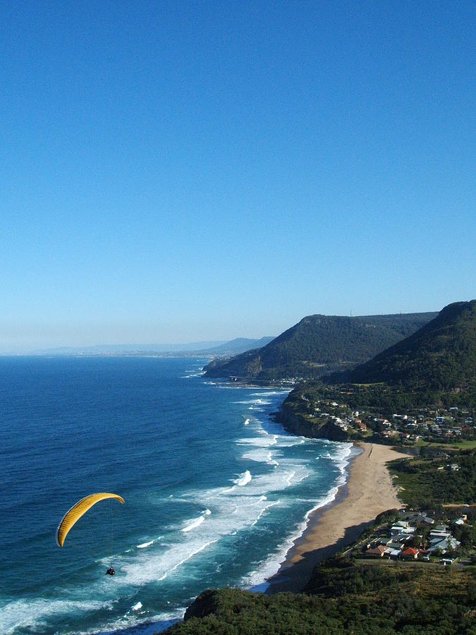 Paraglider Above The Beach Photograph by Jaypc