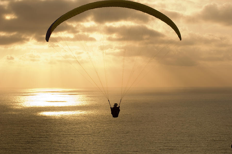 Paraglider Flying In The Sky Over An Photograph by Panoramic Images