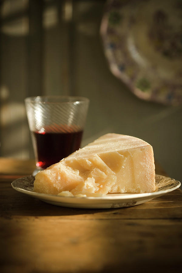 Parmesan And A Glass Of Red Wine Photograph by Colin Cooke