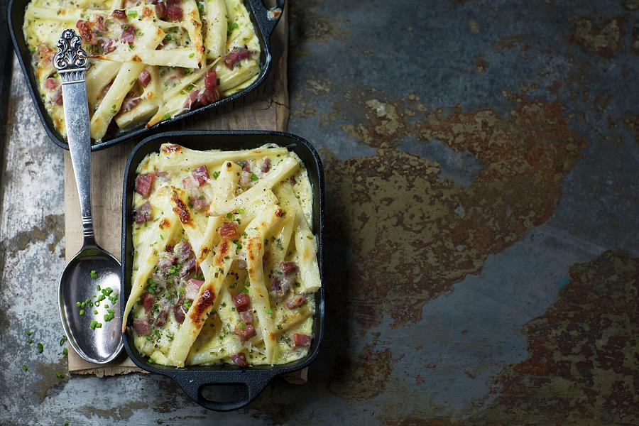 Parsley Root Gratin With Bacon And Herbs Photograph by Joerg Lehmann