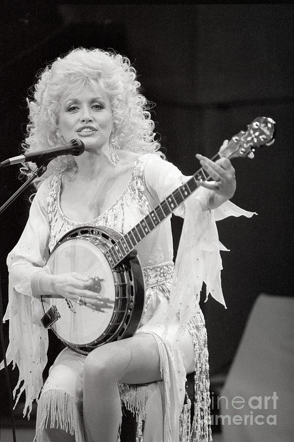 Parton Playing Banjo In Concert Photograph by Bettmann