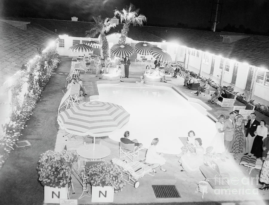 Party By Swimming Pool At Normandy Photograph by Bettmann