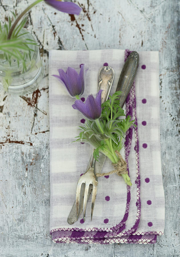 Pasque Flower As A Napkin Decoration On Silver Cutlery Photograph by Martina Schindler