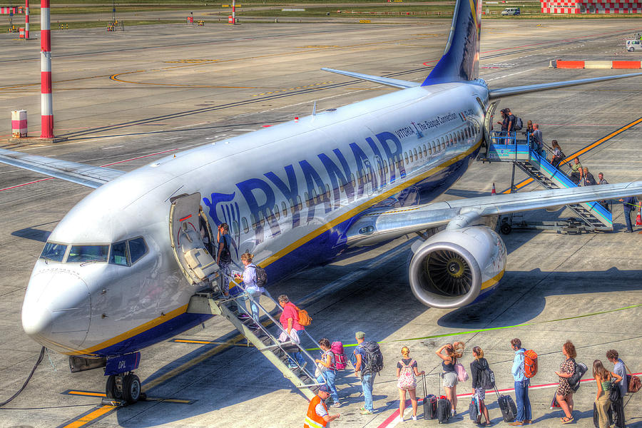 Passengers Boarding An Aircraft Photograph