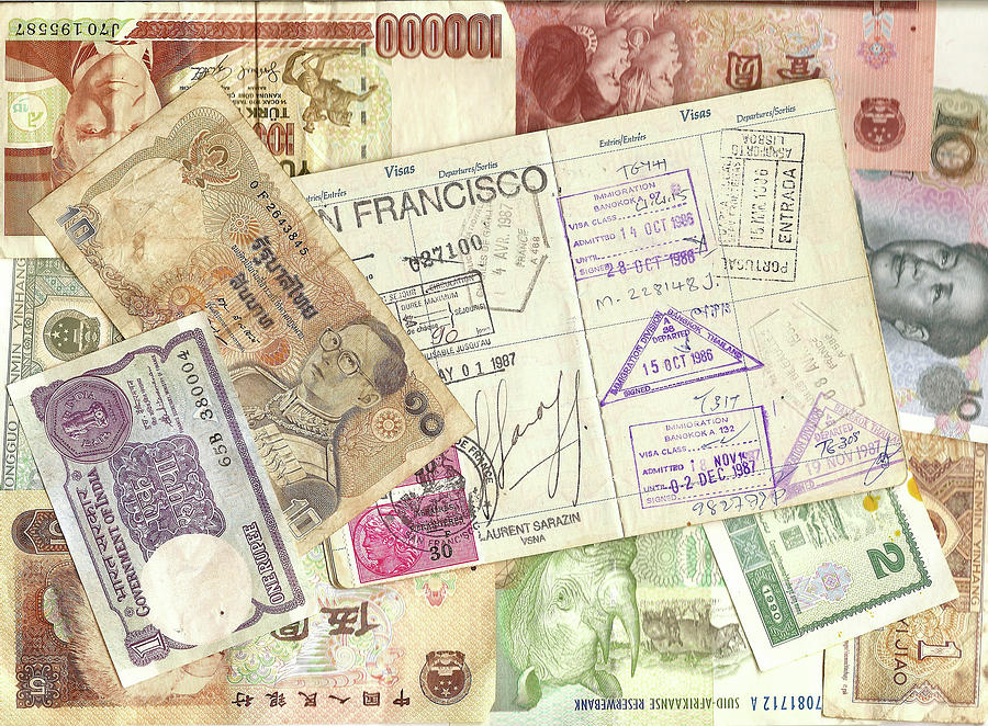 Passport and foreign currency Photograph by Steve Estvanik