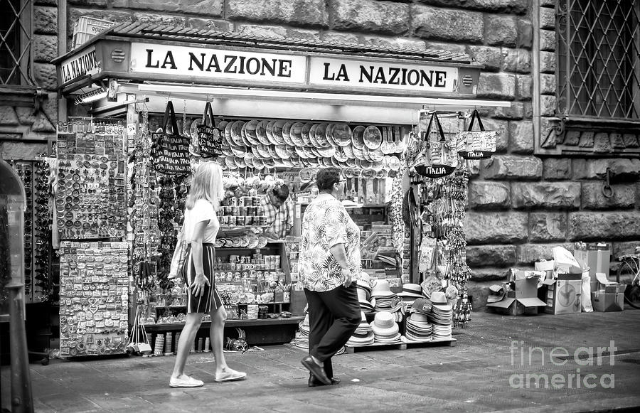 Past the Newsstand in Florence Photograph by John Rizzuto