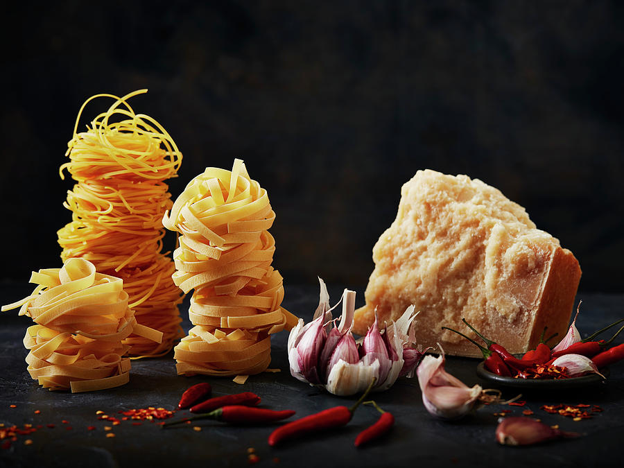 Pasta, Garlic, Chilli And Parmasan Cheese Photograph by Ali Sid