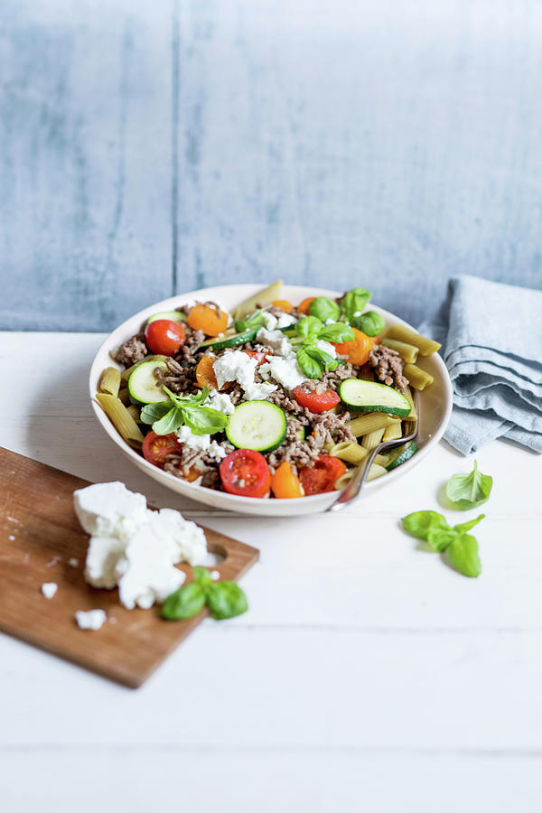 Pasta Salad With Peas, Zucchini, Minced Meat And Feta Photograph by Claudia Timmann