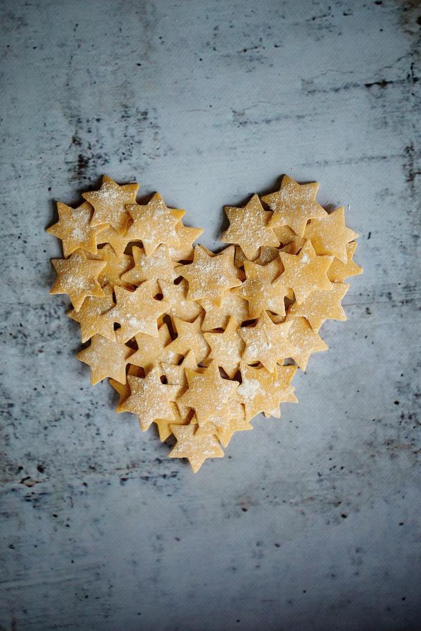 Pasta Stars In A Heart Shape Photograph by Tina Engel