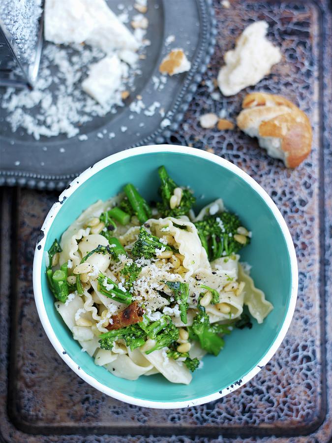 Pasta With Broccoli, Chillies, Pine Nuts And Parmesan Photograph by Garlick, Ian
