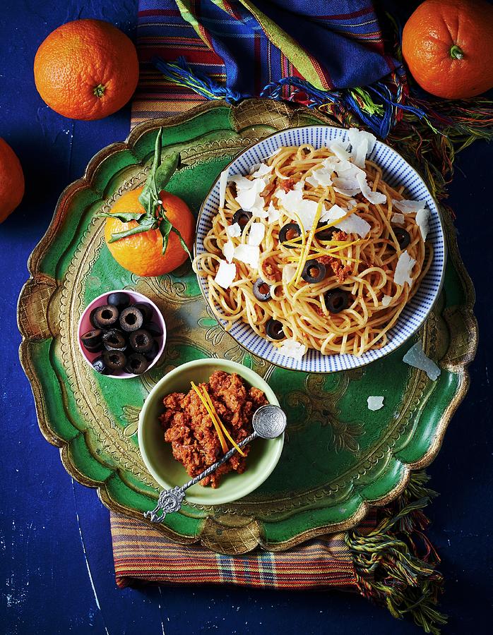 Pasta With Orange Pesto And Black Olives Photograph by Hannah Kompanik