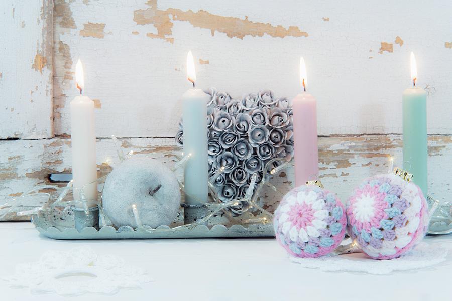 Pastel Candles On Tray And Christmas-tree Baubles With Crocheted Covers Photograph by Bildhbsch