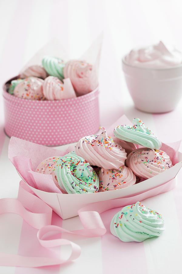 Pastel Coloured Meringues With Sugar Sprinkles Photograph by Andrew Young
