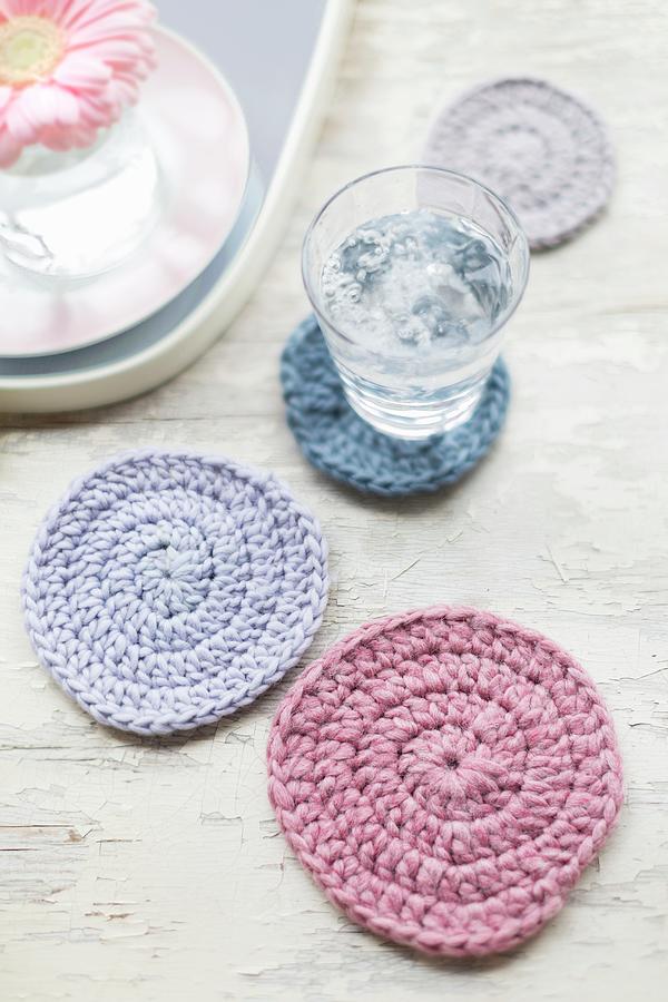 Pastel Crocheted Coasters Photograph by Sabine Lscher