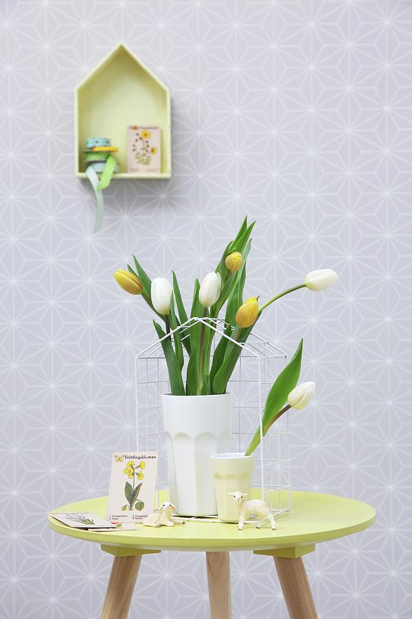 Pastel Easter Arrangement; Vase Of Tulips And Lamb Ornament On Small Table Photograph by Thordis Rggeberg