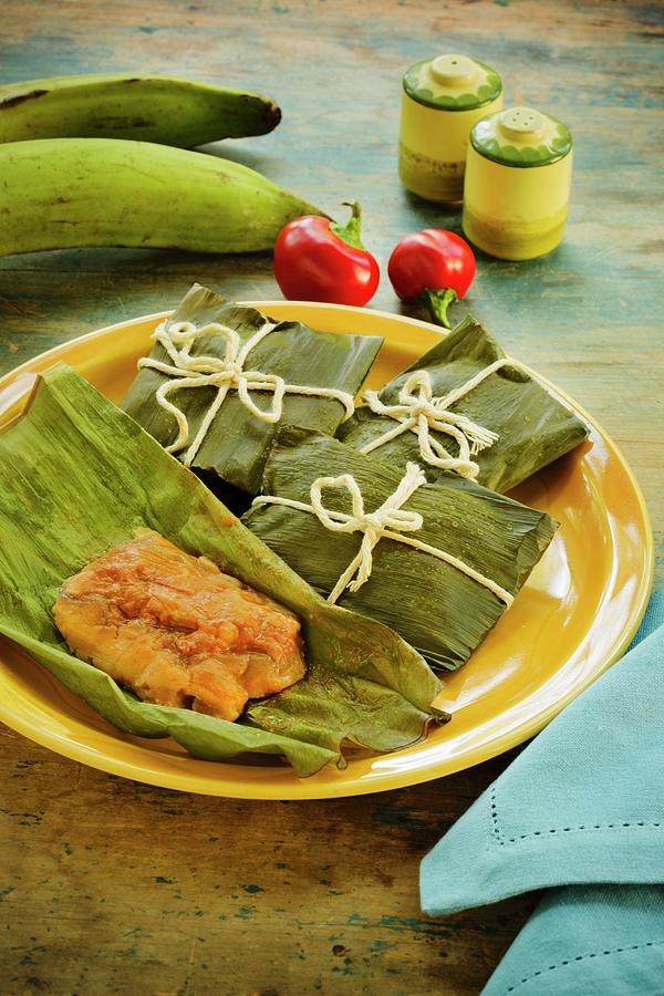 Pasteles spicy, Stuffed Banana Leaves, Puerto Rico Photograph by Colin Cooke