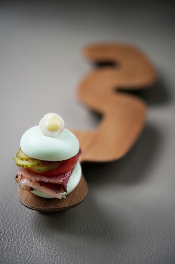 Pastrami Sandwich With Gherkin Macaron, Gherkin, Tomato And Bbq Sauce From The Restaurant the Table In Hamburg, Germany Photograph by Jalag / Maria Schiffer