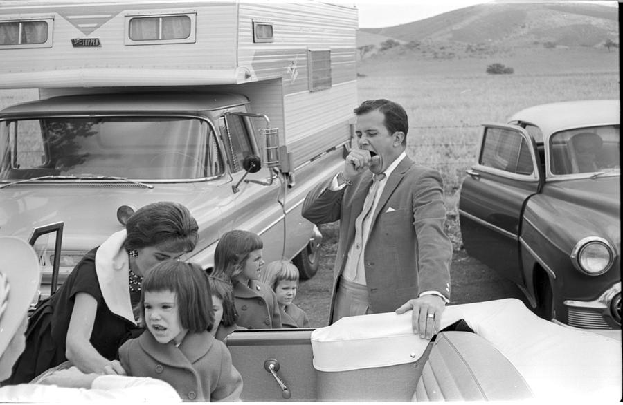 Black And White Photograph - Pat Boone Yawning While His Wife by Bill Kobrin