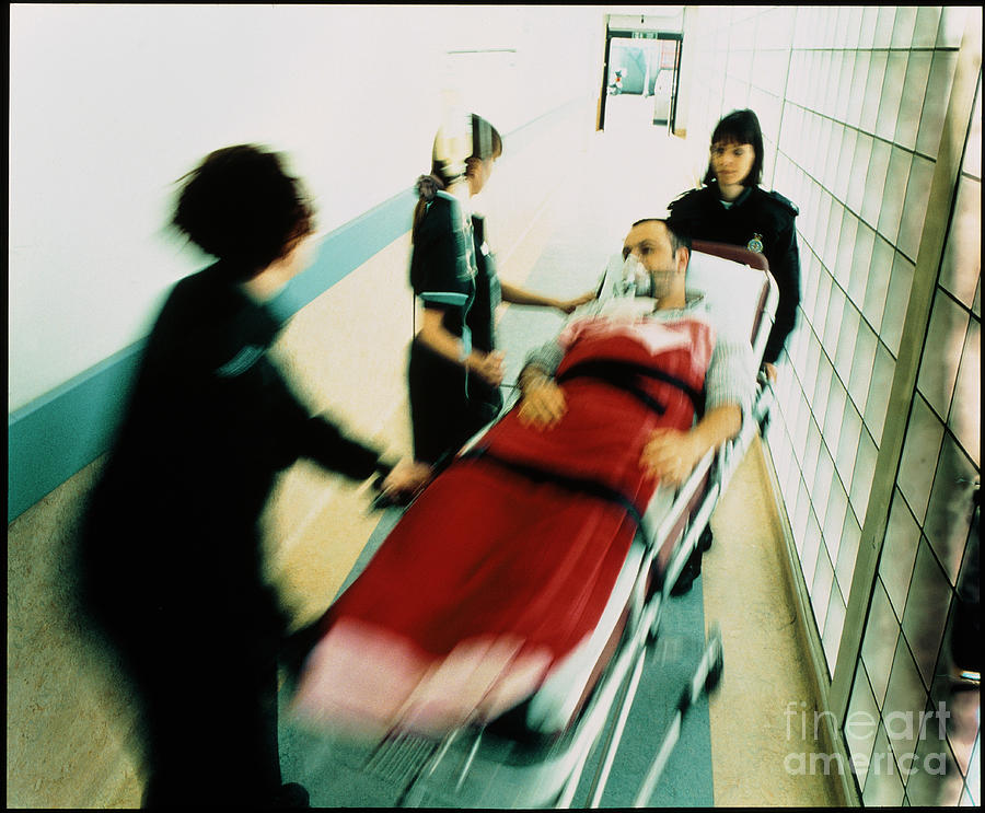 Patient Being Rushed For Emergency Treatment Photograph by Tim Beddow/science Photo Library