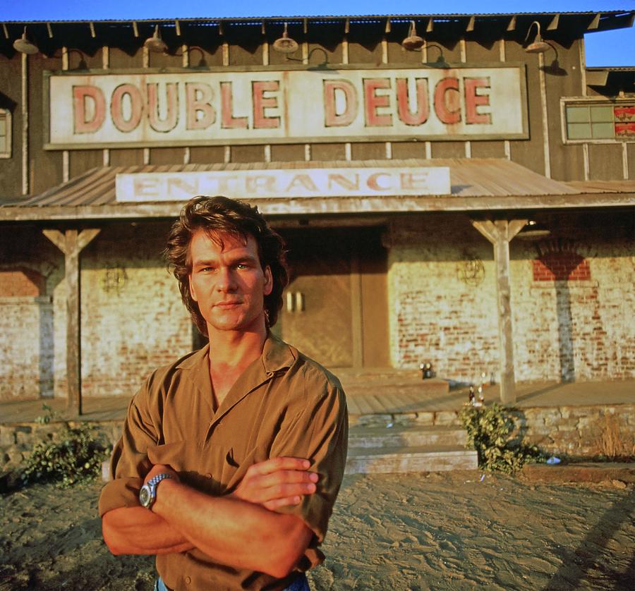 PATRICK SWAYZE in ROAD HOUSE -1989-. Photograph by Album