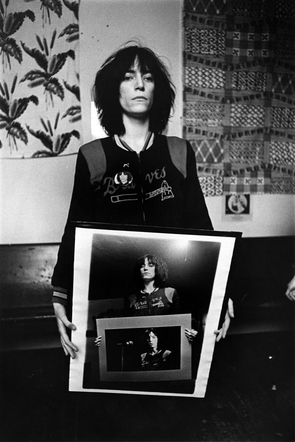 Patti Smith Portrait Holding Pictures Photograph by Richard Mccaffrey