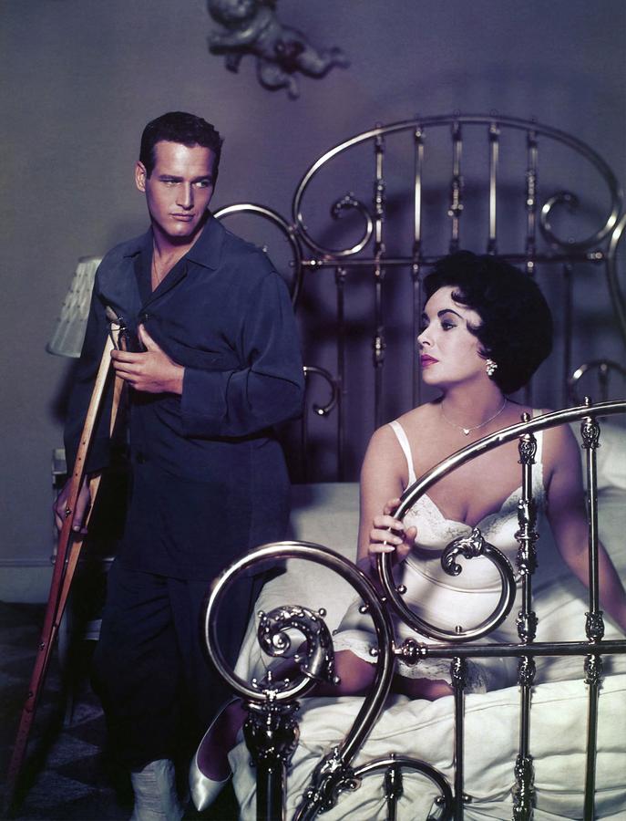 PAUL NEWMAN and ELIZABETH TAYLOR in CAT ON A HOT TIN ROOF -1958-. Photograph by Album