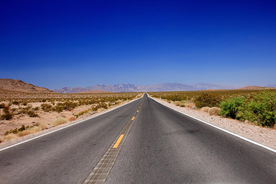 Paved Road In Rural Landscape by Felix Behnke