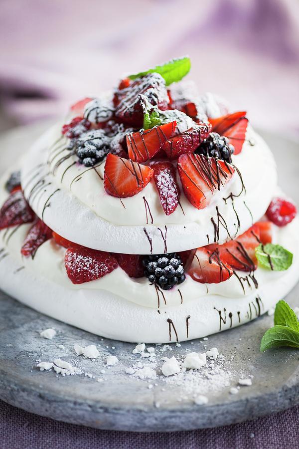Pavlova With Berries And Mint Photograph by Eising Studio