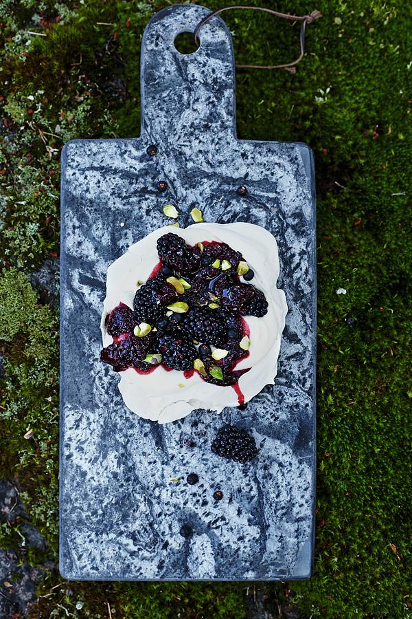 Pavlova With Blackberries And Pistachios Photograph by Aina C. Hole