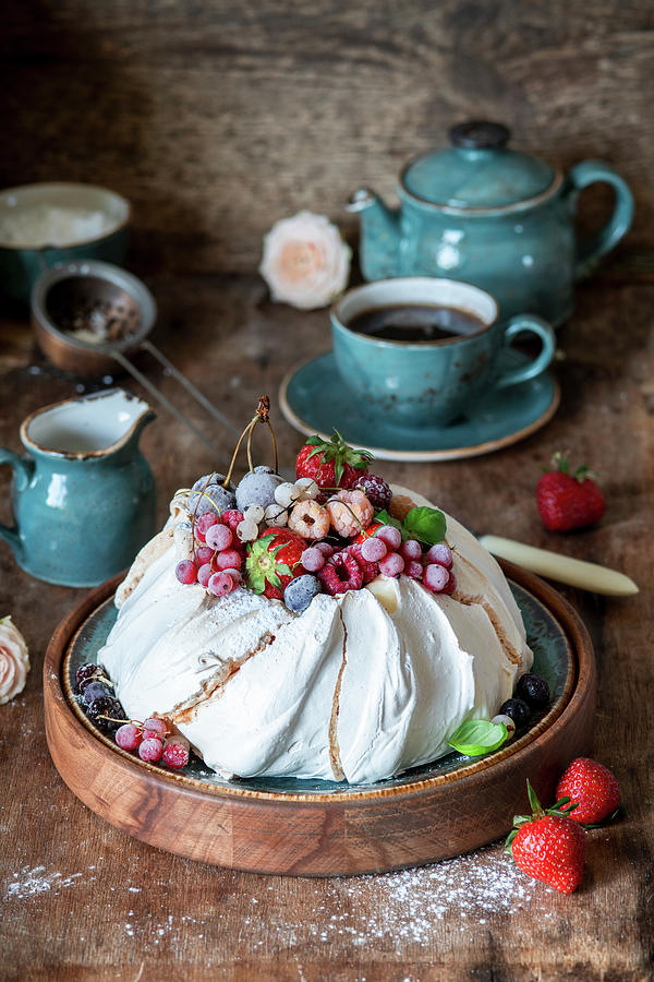 Pavlova With Fresh And Frozen Berries Photograph by Irina Meliukh