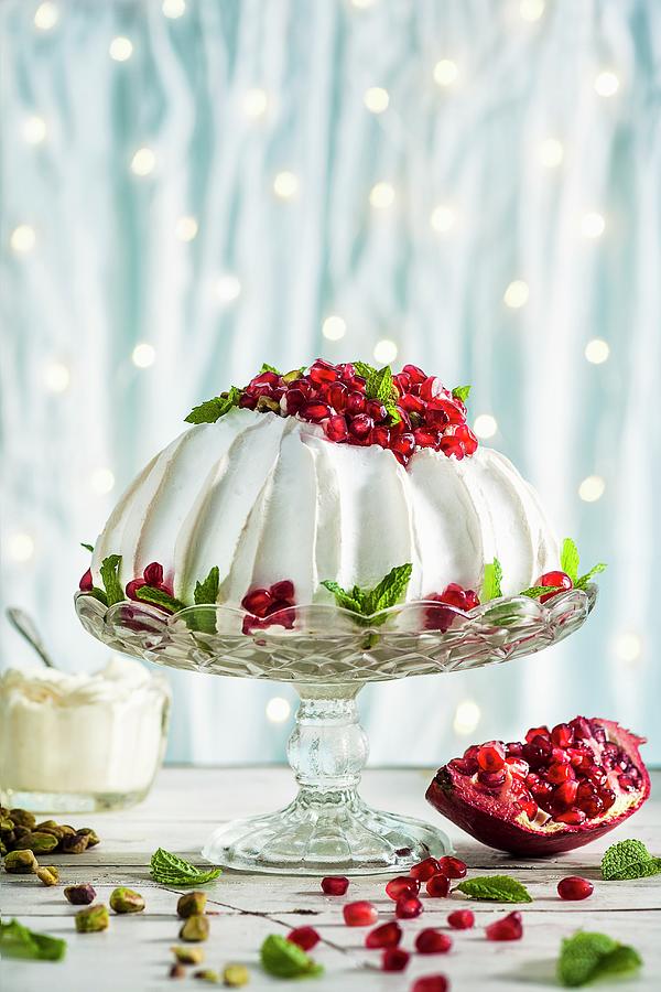 Pavlova With Pomegranate Seeds And Pistachio Nuts christmas Photograph by The Food Union