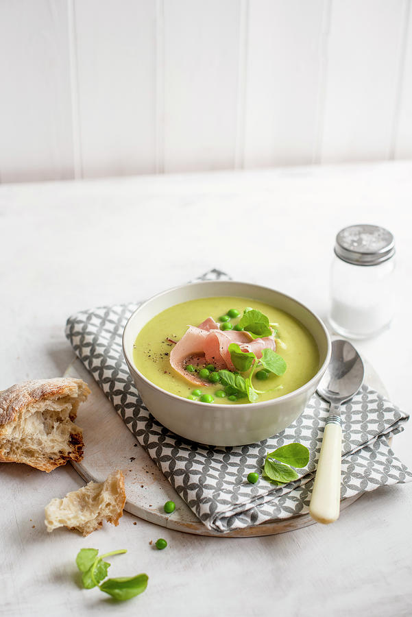 Pea And Ham Soup With Pea Shoots And Bread Photograph by Magdalena Hendey