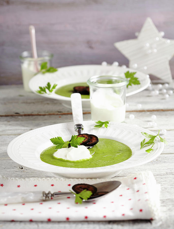 Pea And Parsley Soup With Candied Walnuts And Crme Frache Photograph by Teubner Foodfoto