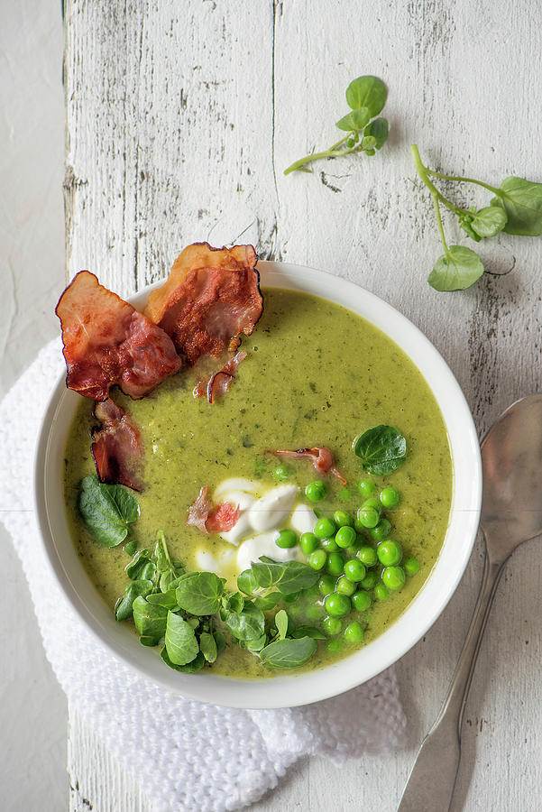 Pea And Watrcress Soup With Crispy Air Dried Ham And Cream Photograph by Magdalena Hendey