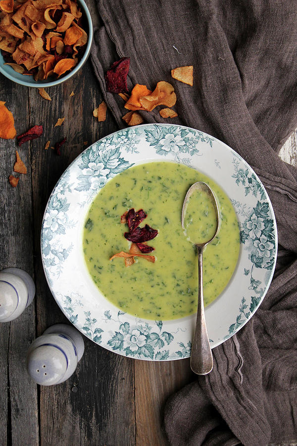 Pea Cream Soup With Vegetable Chips Photograph by Patricia Miceli