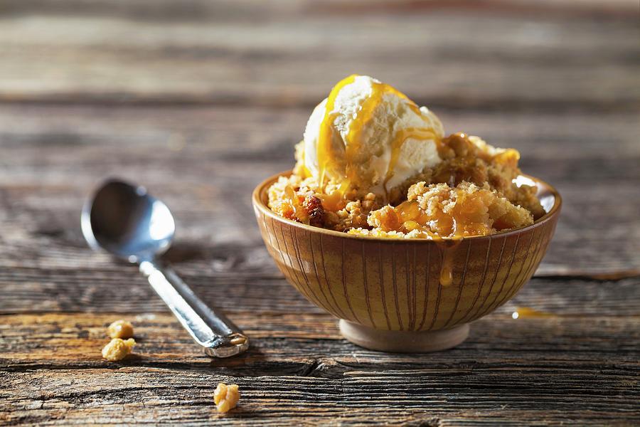 Ice Cream Photograph - Peach Cobbler With Vanilla Ice Cream And Caramel Sauce by George Crudo