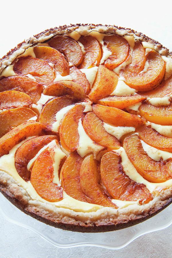 Peach Tart On A Cake Stand Photograph by Amy Kalyn Sims